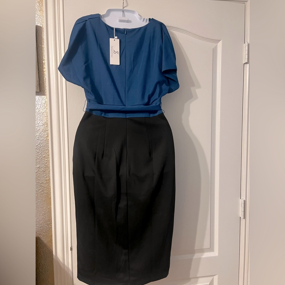 NEW WITH TAGS Beautiful blue and black color block dress. Size medium.